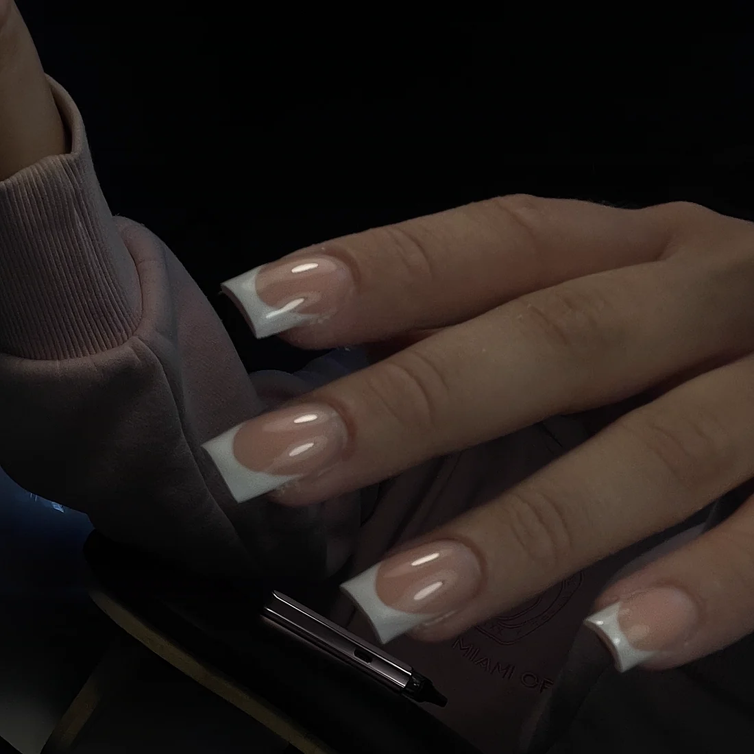 Crisp white french on long square nails