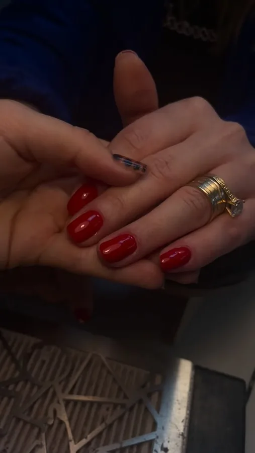 Red manicure created by Jenny
